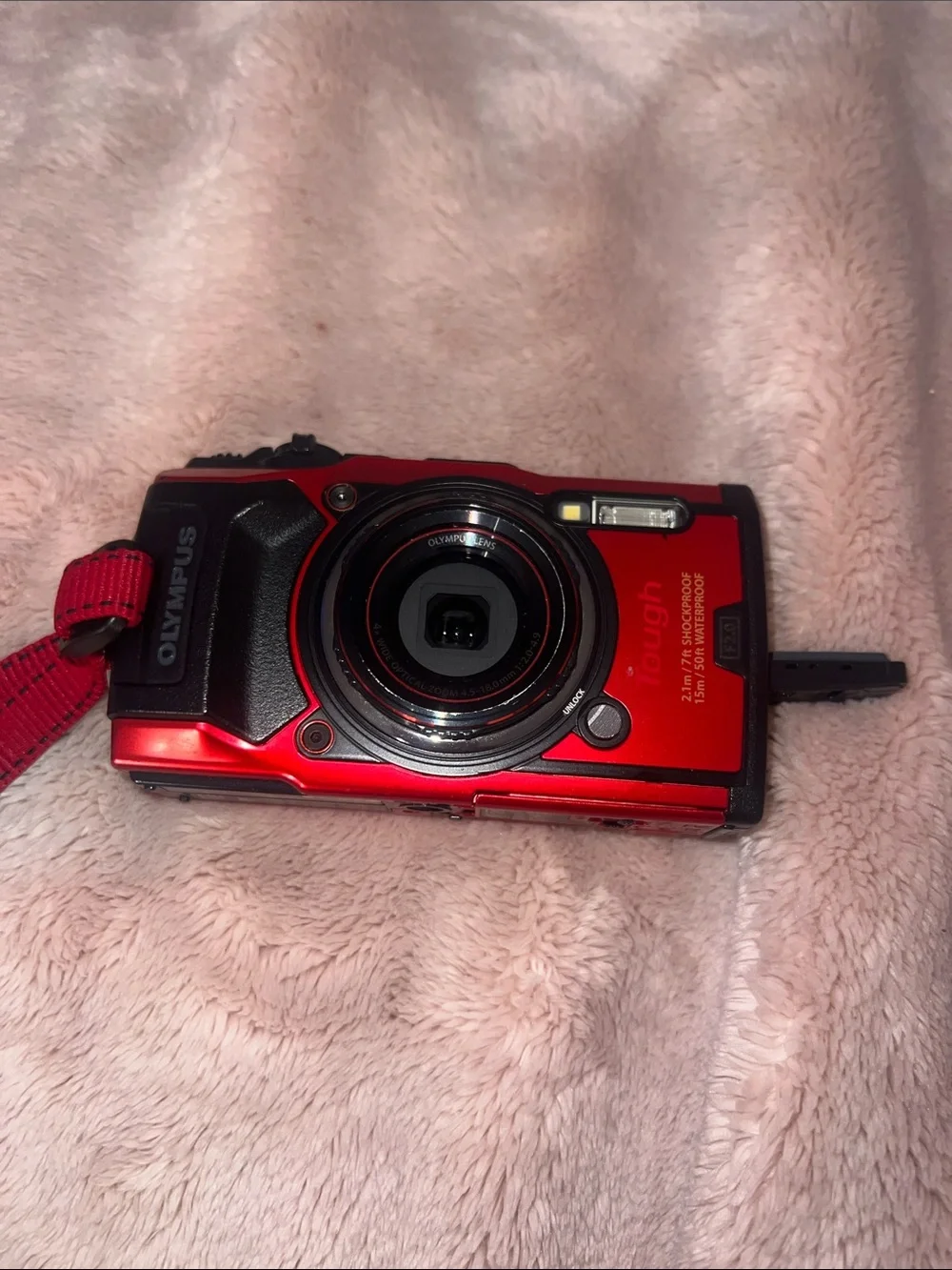 Olympus Red and Black Digital Camera with HDMI Port